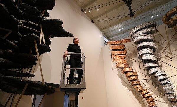 rtist Blane De St. Croix put the final touches on "How to Move a Landscape" at Mass MoCA.SUZANNE KREITER/GLOBE STAFF