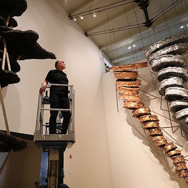 rtist Blane De St. Croix put the final touches on "How to Move a Landscape" at Mass MoCA.SUZANNE KREITER/GLOBE STAFF