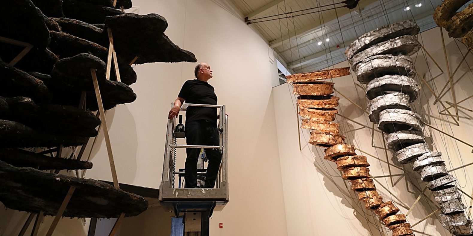 Artist Blane De St. Croix put the final touches on "How to Move a Landscape" at Mass MoCA.SUZANNE KREITER/GLOBE STAFF