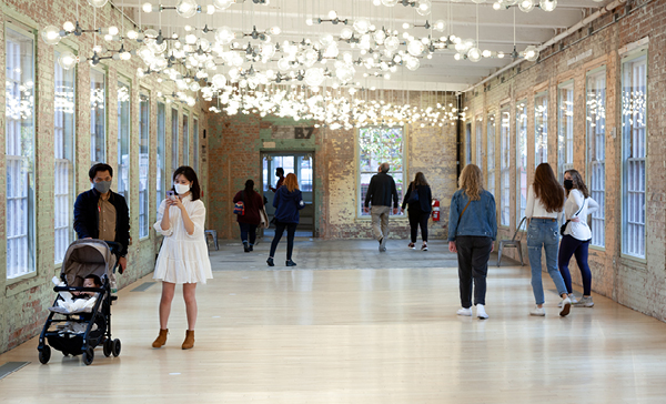 Community Day feature image, visitors in Spencer Finch's Cosmic Latte