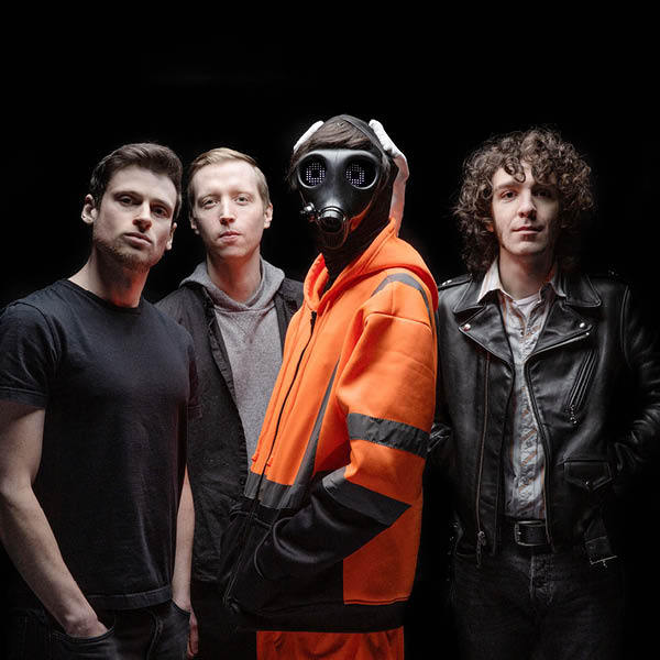 Car Seat Headrest feature image, four band members against black background, Will Toledo in orange sweatshirt with black gas mask on