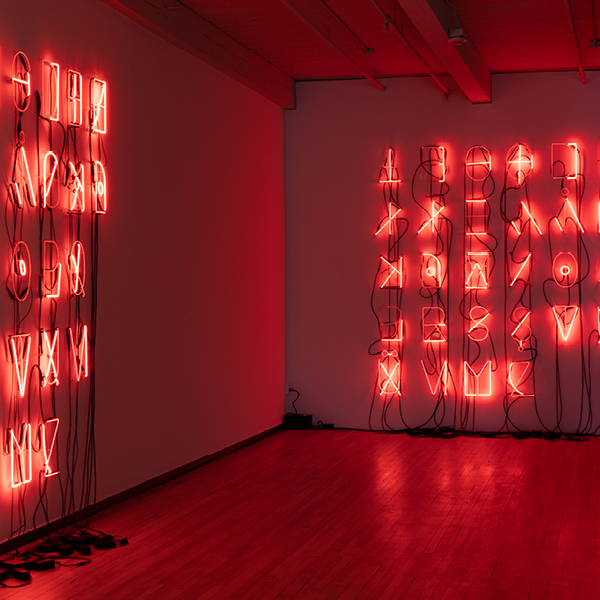 Feature image for Pop-Up Talk with Aslı Çavuşoğlu, Çavuşoğlu's installation ANNEX red neon lettering